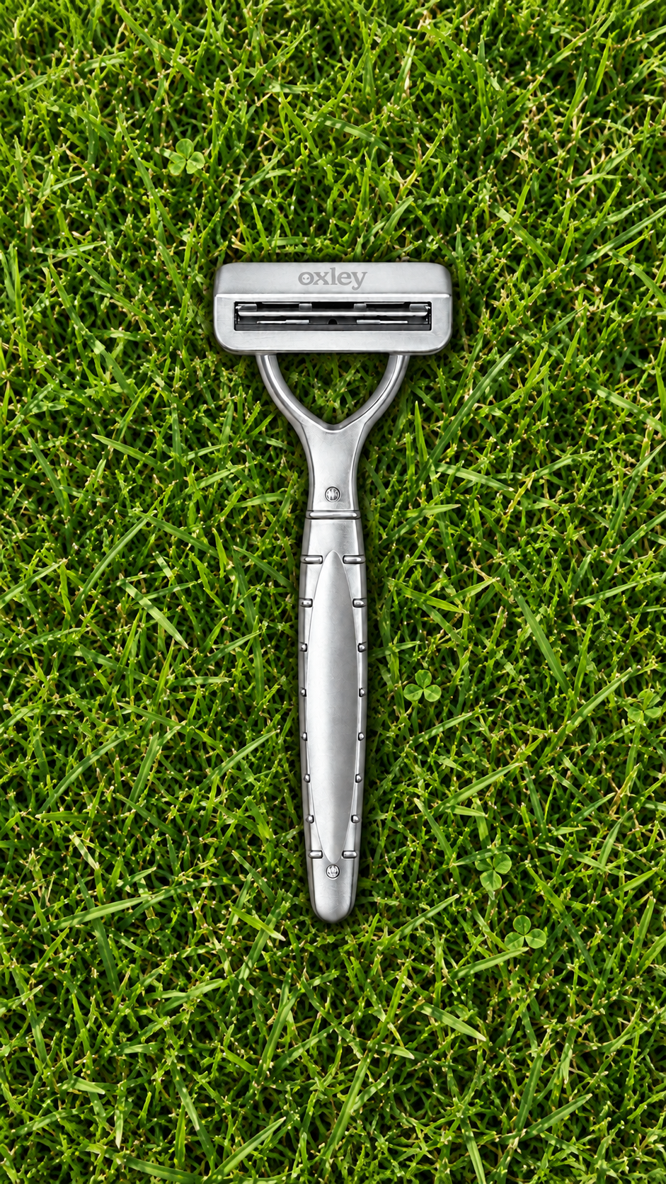 Oxley razor resting on green grass